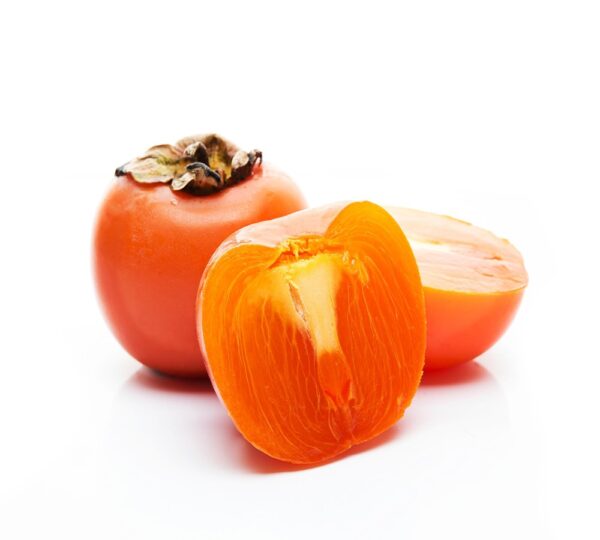 fresh seasonal persimmon isolated white background close